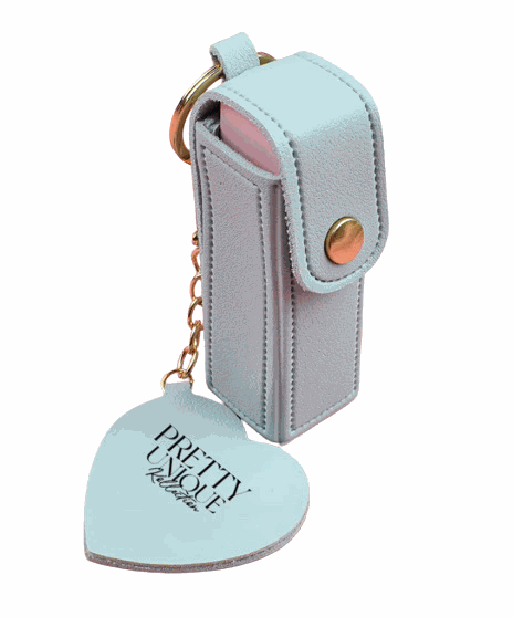Sky blue luxe bag keychain holding lip oils for organized, stylish hydration on the go